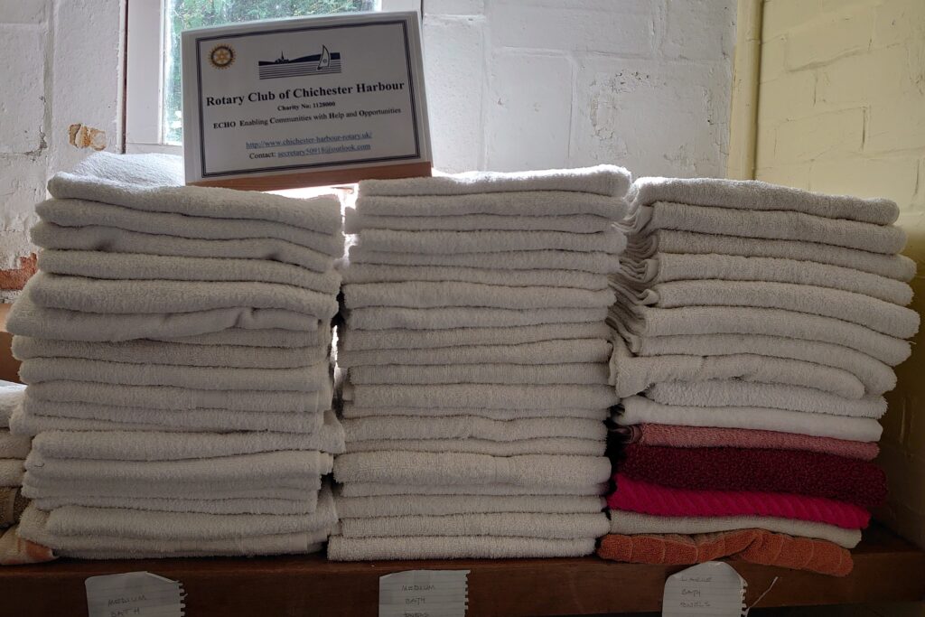 Stack of towels ready to be donated to families in need by The Rotary Club of Chichester Harbour.