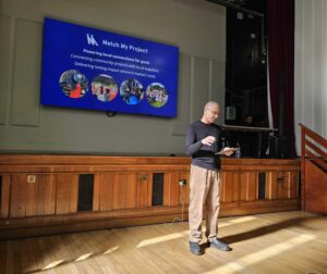 CEO and co-founder of Match My Project introduces the platform at the Social Value Lambeth launch at Lambeth Town Hall.